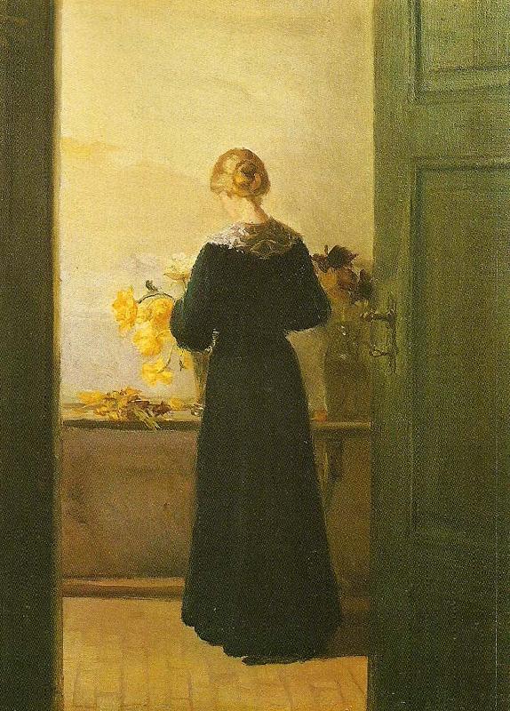 Anna Ancher en ung pige ordner blomster France oil painting art